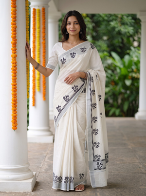 Cotton White Kerala Saree with Black Floral Print Pallu and Silver Zari Border