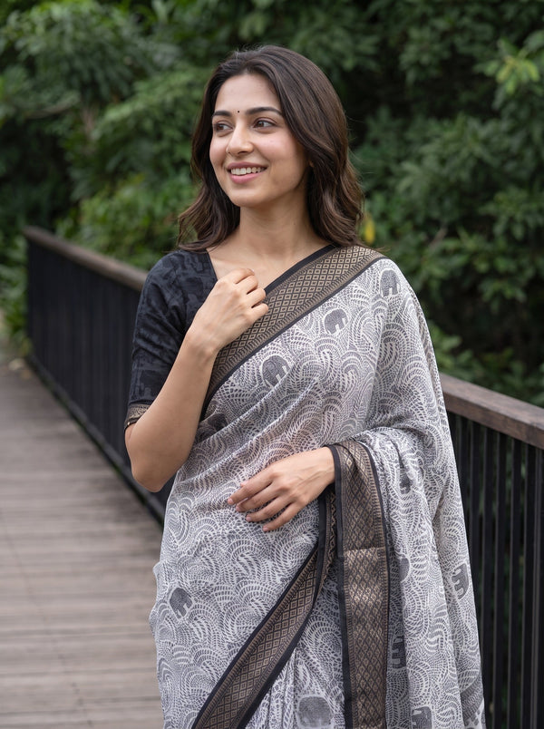 Polycotton White Black Elephant Procession Border Pallu Saree with Leaf Vine Block Print