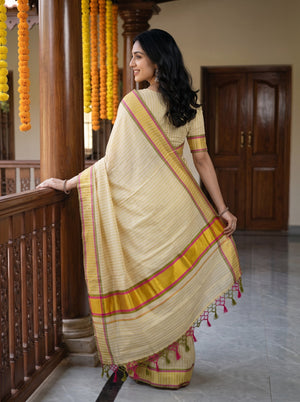 Tissue Pale Yellow Gold Pinstripe Saree with Multicolor Border Onam Special Kerala Saree