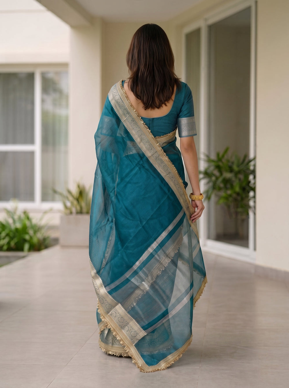 Tissue Banarasi Teal Plain Saree with Gold Zari Border
