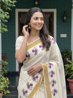 Cotton Cream Purple Floral Print Kerala Saree with Golden Zari Border