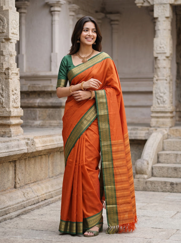 Semi Silk Orange Golden Pinstripe Saree with Green Zari Border
