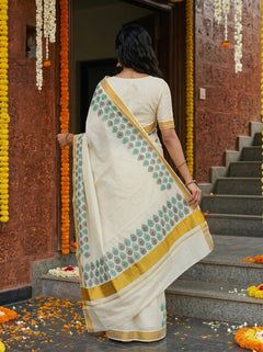 Cotton Cream Green Peacock Eye Motif Border with Golden Zari Border Onam Special Kerala Saree
