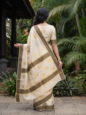 Tissue Cream Golden Zari Lotus Motif Black Golden Checkered Border Kerala Saree