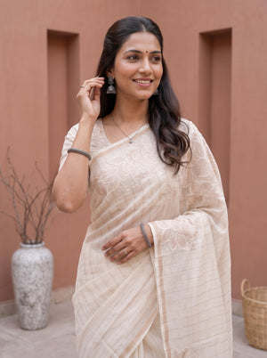 Mul Chanderi Off White Saree with Rose Golden Floral Embroidery and Subtle Striped Pattern