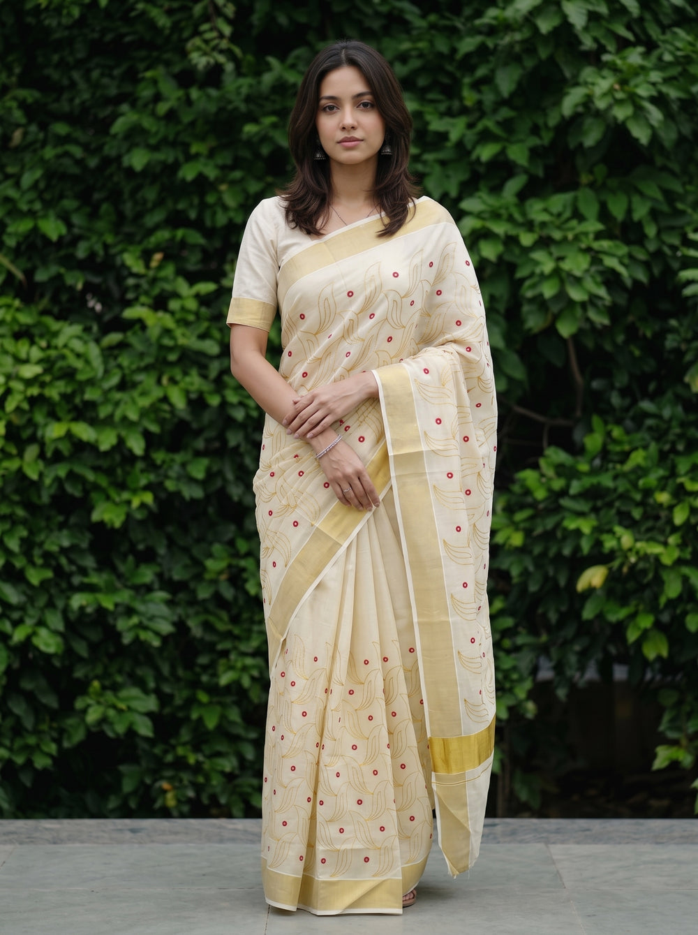 Tissue Cream Embroidered Leaf Kerala Kasavu Saree with Red Mirror Work