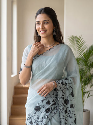 Net Kota Saree in Powder Blue with Black Floral Embroidery