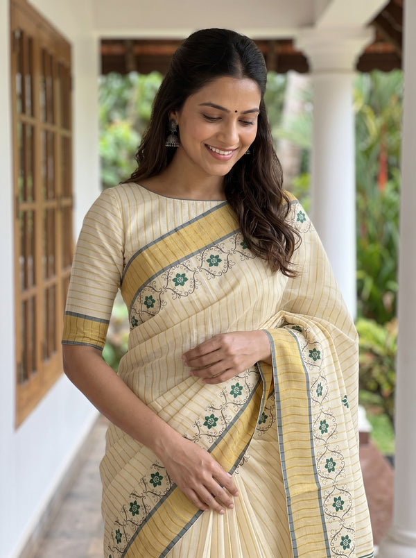 Tissue Cream and Green Floral Vine Border Onam Kerala Saree