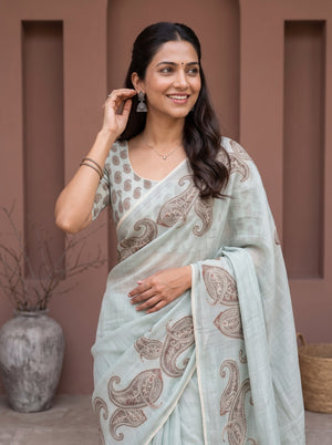 Tissue Saree in Pastel Blue with Intricate Paisley Embroidery and Sequin Detailing
