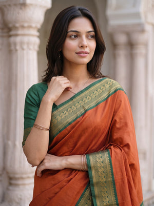 Semi Silk Orange Golden Pinstripe Saree with Green Zari Border