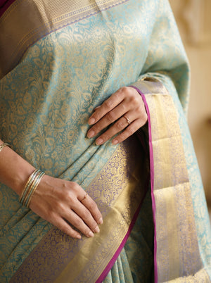 Kanjivaram Teal Green  Saree with Gold Zari Floral Jaal Weave, Dual-Tone Antique Border