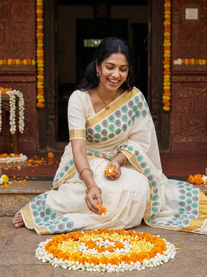 Cotton Cream Green Peacock Eye Motif Border with Golden Zari Border Onam Special Kerala Saree
