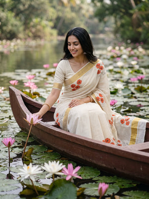 Cotton Cream Orange Cosmos Floral Print Kerala Saree with Golden Zari Border