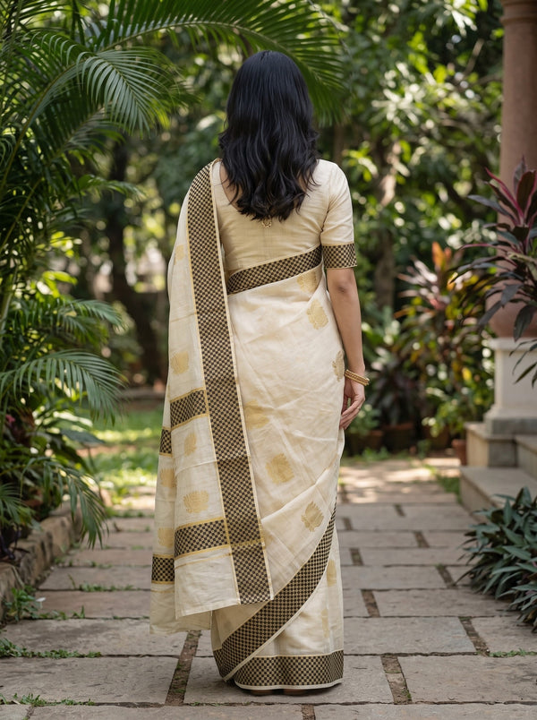 Tissue Cream Golden Zari Lotus Motif Black Golden Checkered Border Kerala Saree