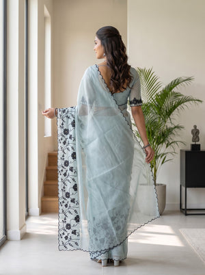 Net Kota Saree in Powder Blue with Black Floral Embroidery