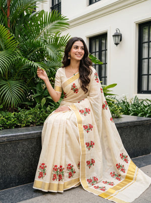 Tissue Cream Kerala Saree with Red Floral Print Pallu, Golden Zari Border