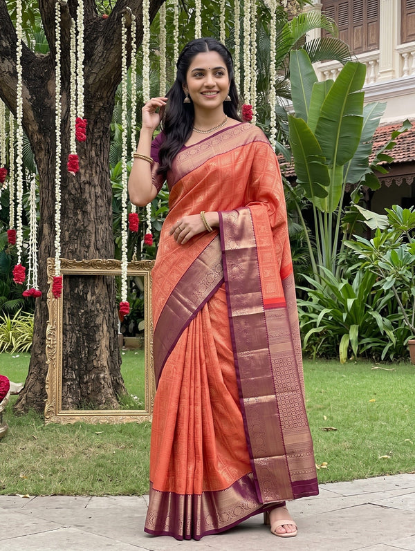 Kanjivaram Brocade Saree in Rust Orange with Wine Zari Floral Pallu