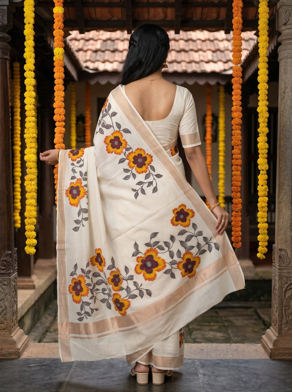 Cotton White MariGolde Orange Floral Print Rose Golden Border Onam Special Kerala Saree