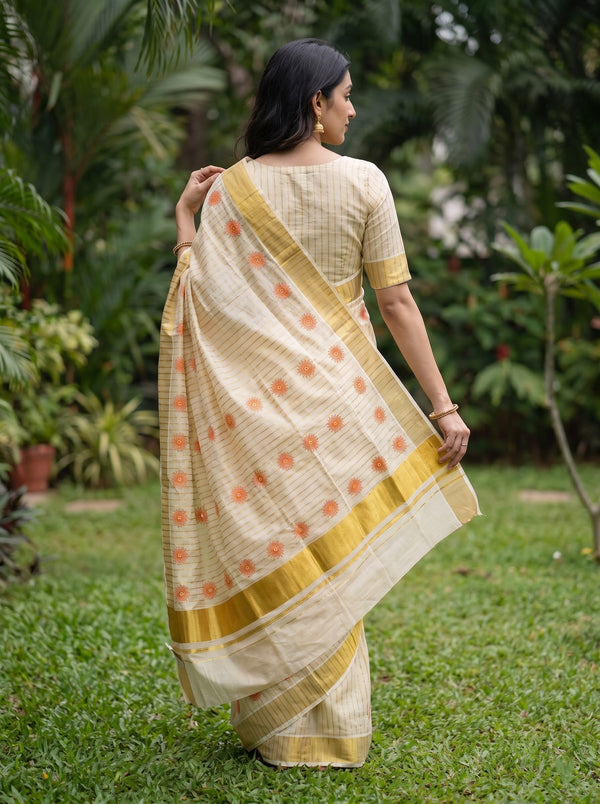 Tissue Cream Orange Lotus Print Kerala Saree with Golden Zari Border