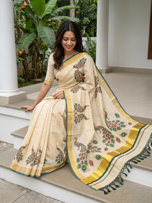 Tissue Cream Kerala Saree with Peacock Print Pallu, Golden Zari Border and Tassels