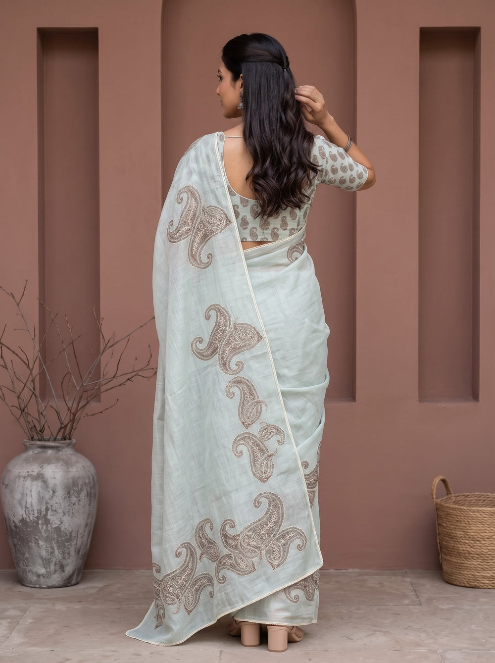 Tissue Saree in Pastel Blue with Intricate Paisley Embroidery and Sequin Detailing