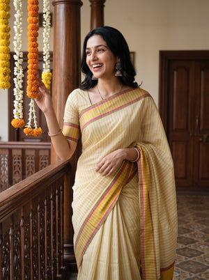 Tissue Pale Yellow Gold Pinstripe Saree with Multicolor Border Onam Special Kerala Saree