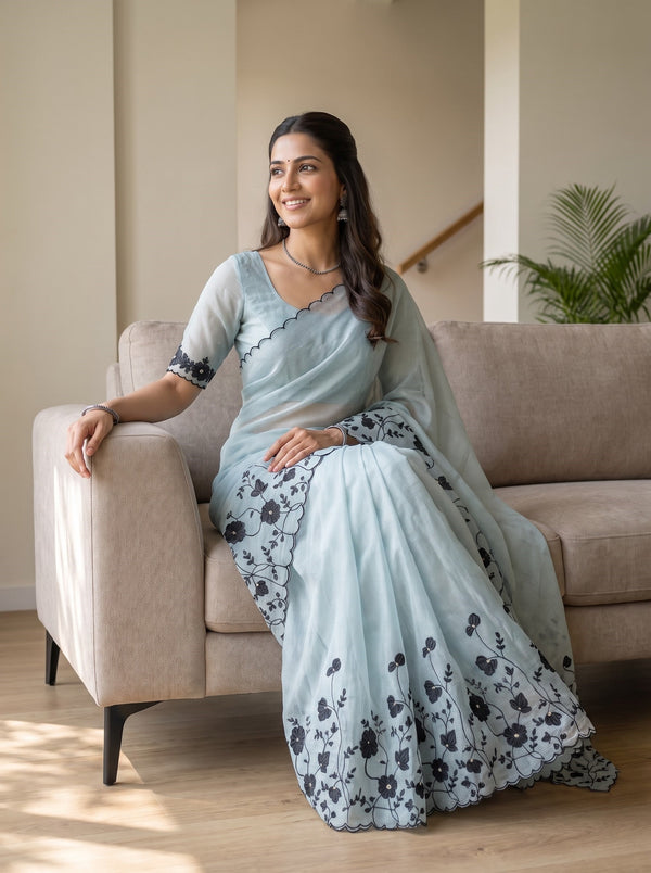 Net Kota Saree in Powder Blue with Black Floral Embroidery