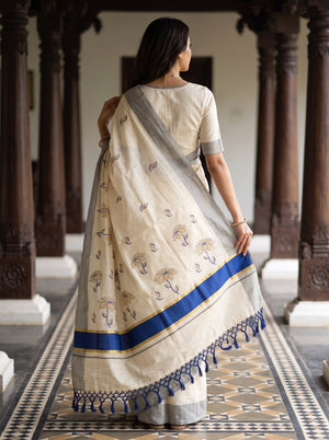 Tissue Cream Golden Navy Blue Floral Embroidered Pallu Broad Blue Zari Border Kerala Saree
