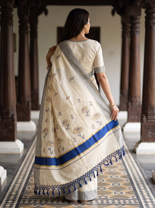 Tissue Cream Golden Navy Blue Floral Embroidered Pallu Broad Blue Zari Border Kerala Saree