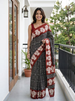 Synthetic Black Rust Red Script Print Jagannath Face Motif Saree