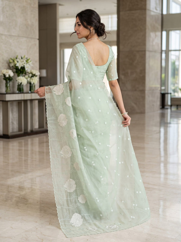 Organza Pastel Green Saree with Floral Border and Dot Booti