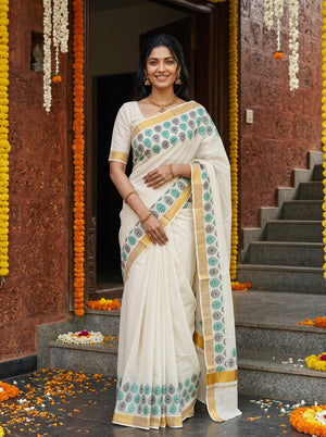 Cotton Cream Green Peacock Eye Motif Border with Golden Zari Border Onam Special Kerala Saree