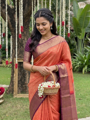 Kanjivaram Brocade Saree in Rust Orange with Wine Zari Floral Pallu
