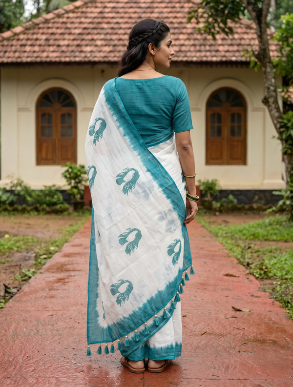 Cotton Off-White Face Print Teal Dip-Dye Border Tassel Saree
