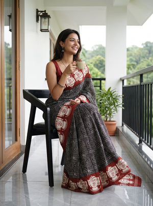 Synthetic Black Rust Red Script Print Jagannath Face Motif Saree
