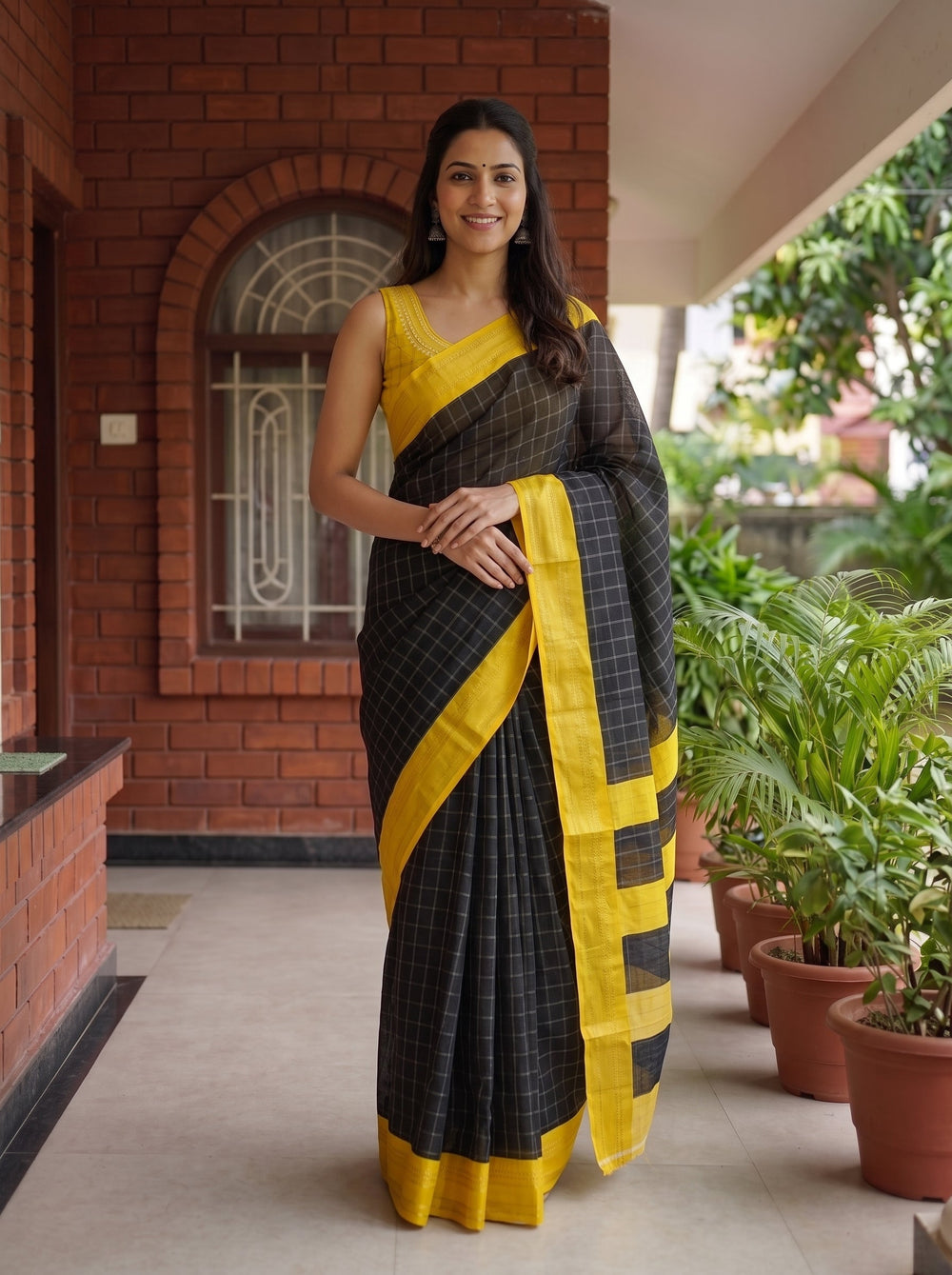 Synthetic Black Checked Saree with Golden Yellow Border