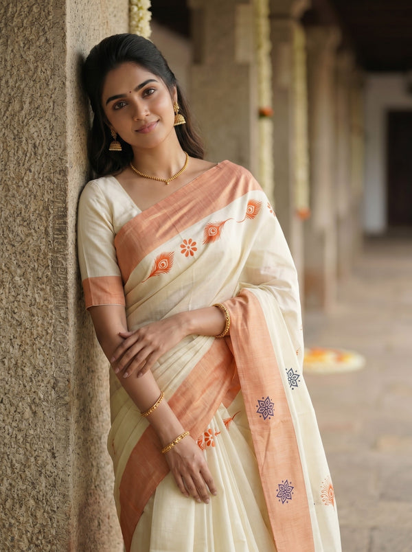 Tissue Cream Peacock Feather Print with Peach Border Onam Special Kerala Saree