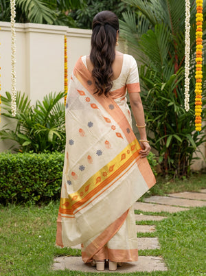 Tissue Cream Peacock Feather Print with Peach Border Onam Special Kerala Saree