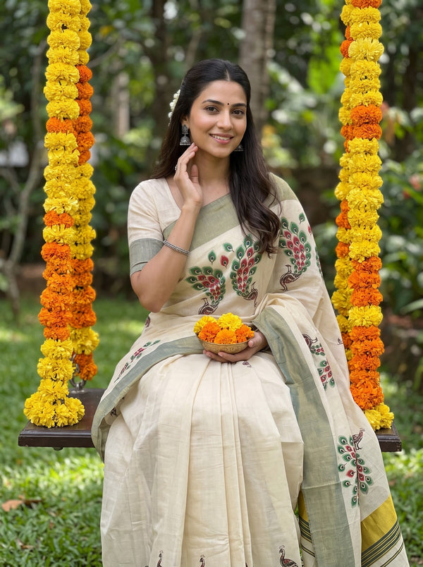Tissue Cream Green Peacock Print Onam Special Kerala Saree with Sage Border and Tassels