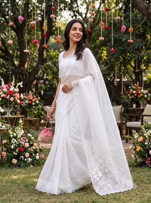 Linen White Saree with Floral Spray Embroidered Pallu and Mirror Work