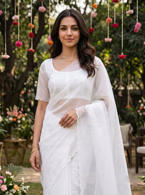 Linen White Saree with Floral Spray Embroidered Pallu and Mirror Work