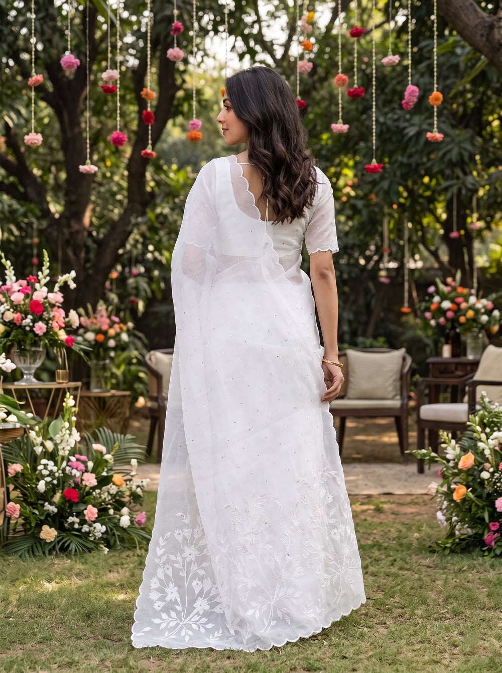 Linen White Saree with Floral Spray Embroidered Pallu and Mirror Work