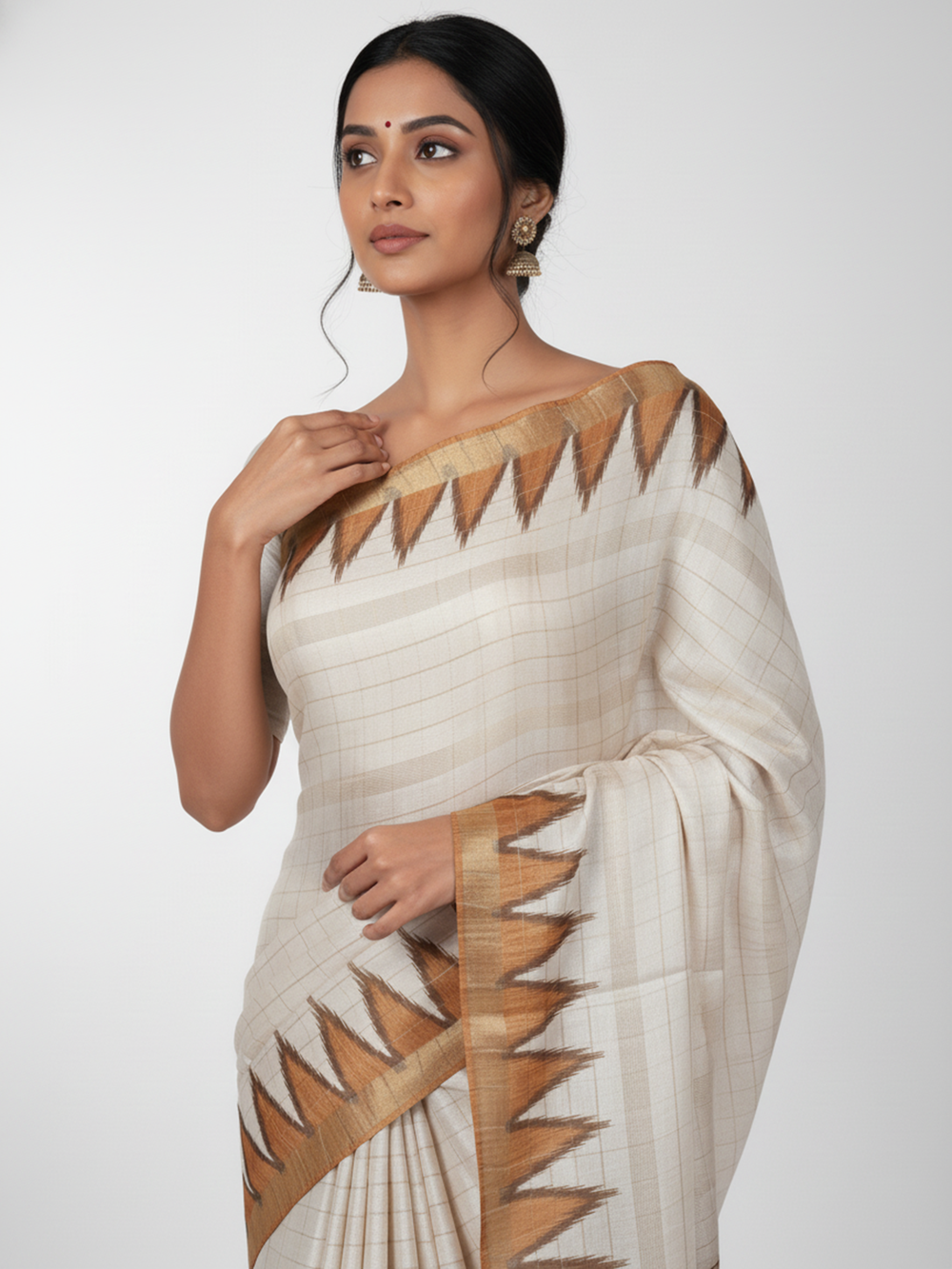 Ivory Semi Jute Silk saree with Pinal Checks With Temple Design Body, Contrast Plain Pallu & Plain Bavanji With Checks Border – Paired with Honey Contrast Pinal Checks Blouse
