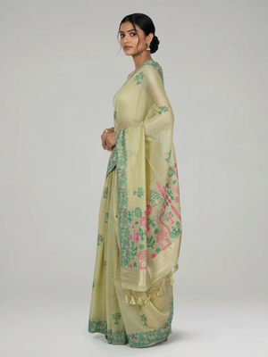 Pista Green Semi Chanderi with Spreaded Tree Buttas Body, Warli Print Pallu & Landscape Border – Paired with Double Shade Pink Butta Design With Border Blouse