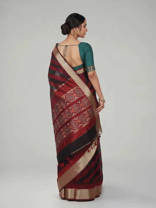 Maroon Ikat Semi Silk Saree with Diagonal pattern Body, Ikat Pattern Pallu & Antic Gold Bavanji Border Border – Paired with Maroon Ikat Design Blouse