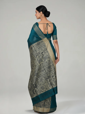 Peacock Blue Semi Jute Silk saree with Plain Body, Contrast With Printed Pallu & Plain With Bavanji Border Border – Paired with Light Ivory Brown Printed Blouse