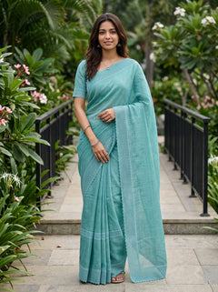 Cotton Linen Teal Saree with Woven Stripe Details and Intricate Lace Border