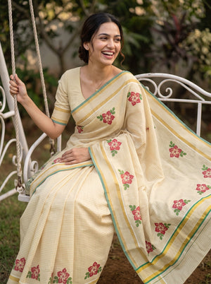 Tissue Cream Kerala Saree with Red Floral Print Pallu and Golden Zari Checks