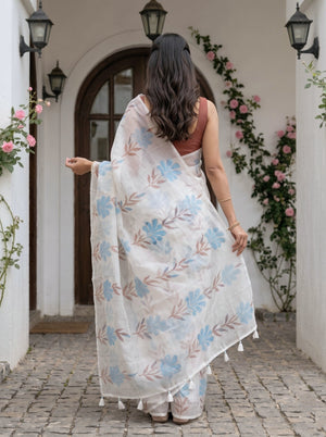 Organza Off-White Turquoise Watercolor Floral Print Saree with White Tassels