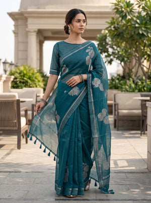 Organza Teal Self-Tone Botanical Motif Saree with Striped Pallu Border and Tassels